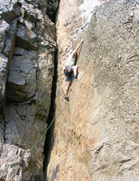 Alan climbing Stennis buttress, Pembroke